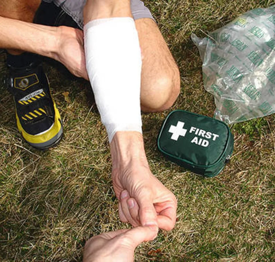 a person with provided with first aid for a bandaged arm for HLTAID011– Provide First Aid