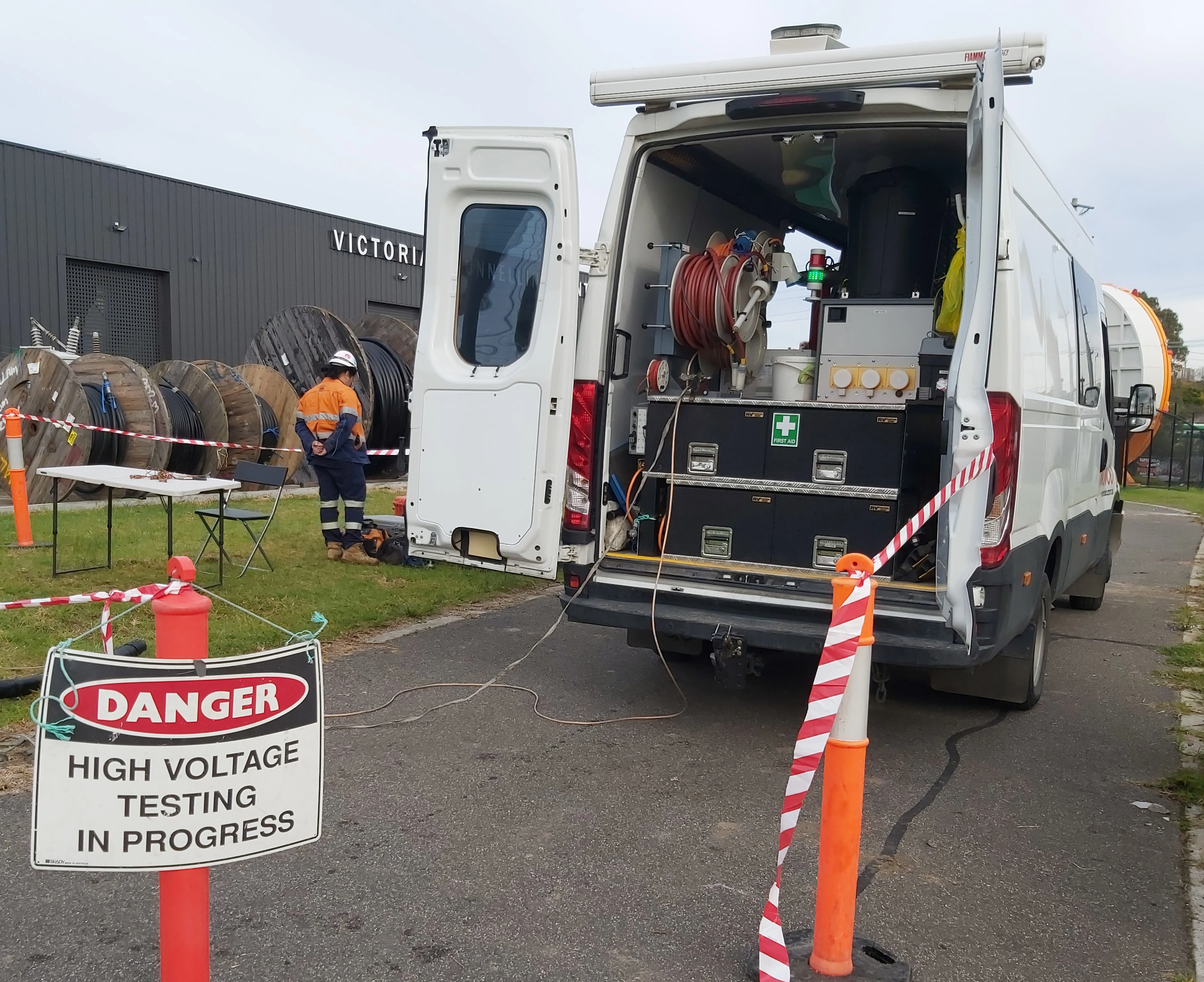 a van with testing equipment and a blicked off section for UETDRDU001 - Conduct HV testing of underground power cable system